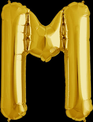 A Gold Letter M Balloon