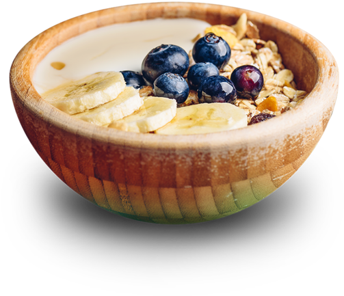 A Bowl Of Oatmeal With Blueberries And Bananas