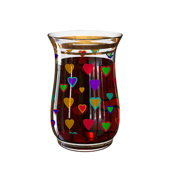 A Glass With A Red Liquid And Colorful Hearts