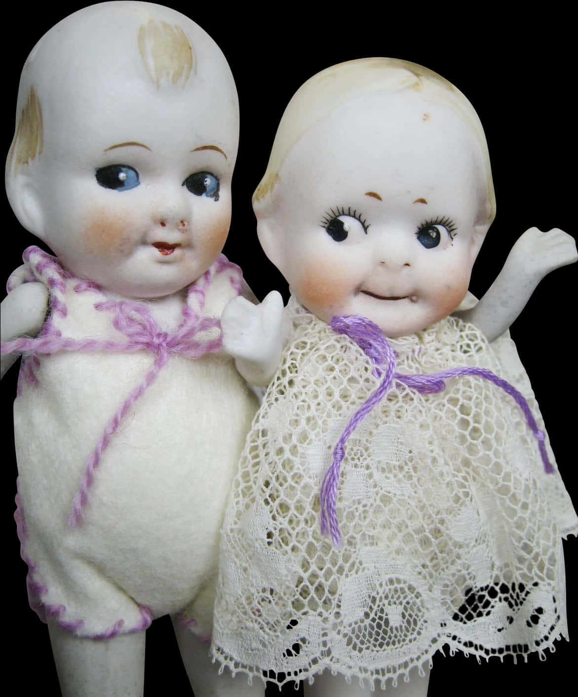 Two Porcelain Dolls With Lace Dresses