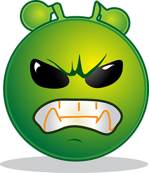 A Green Cartoon Face With Black Eyes And Sharp Teeth