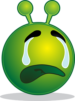 A Green Alien Face With Tears