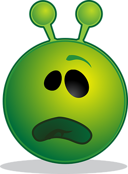 A Green Cartoon Face With A Black Background