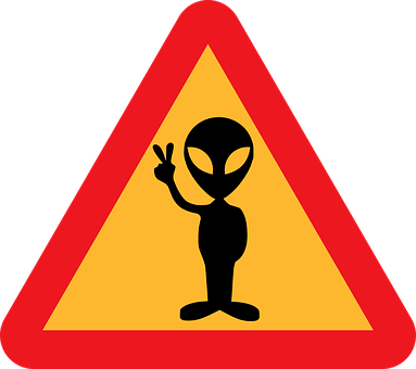 A Sign With A Alien Figure And A Peace Sign