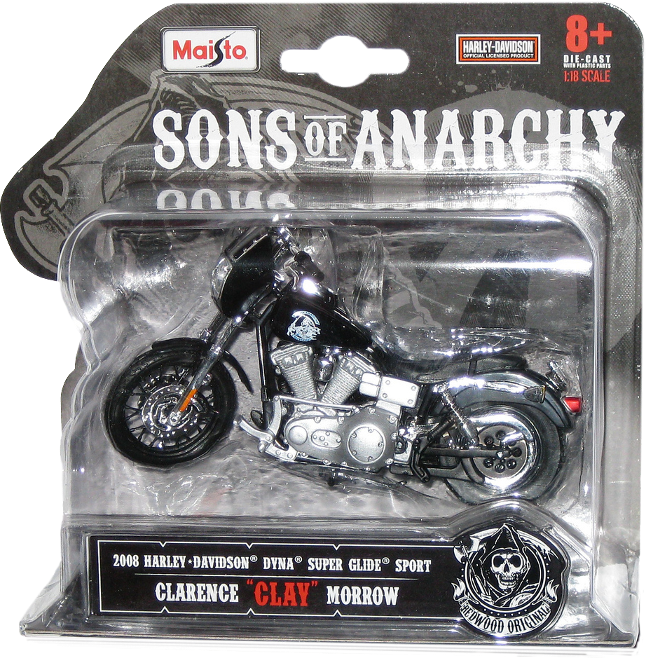 A Toy Motorcycle In A Plastic Package
