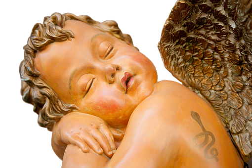 A Statue Of A Sleeping Baby