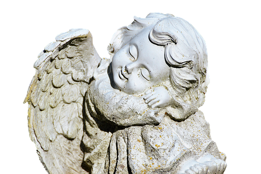 A Statue Of A Sleeping Angel