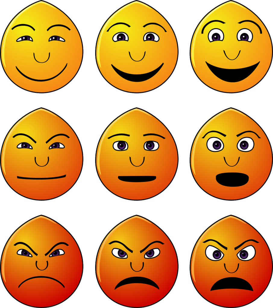 A Group Of Yellow Faces With Different Expressions