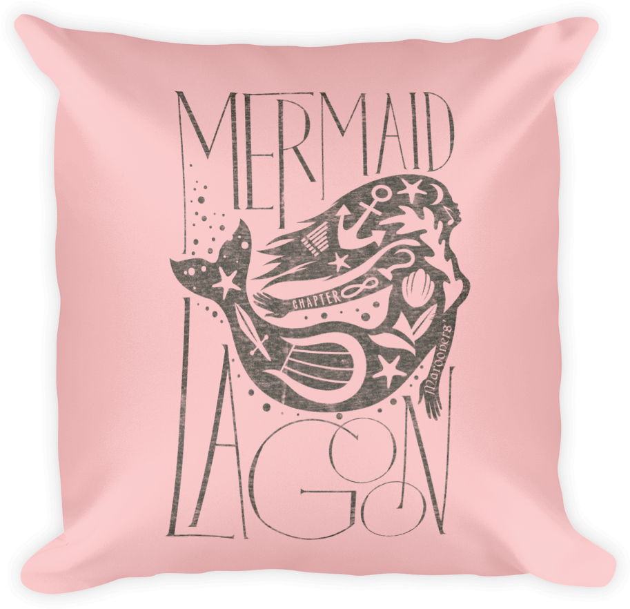 A Pink Pillow With A Mermaid Design On It