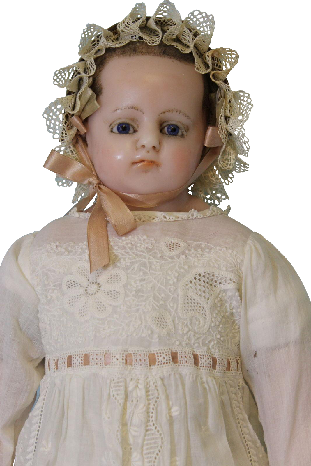 A Doll With A White Dress And Blue Eyes