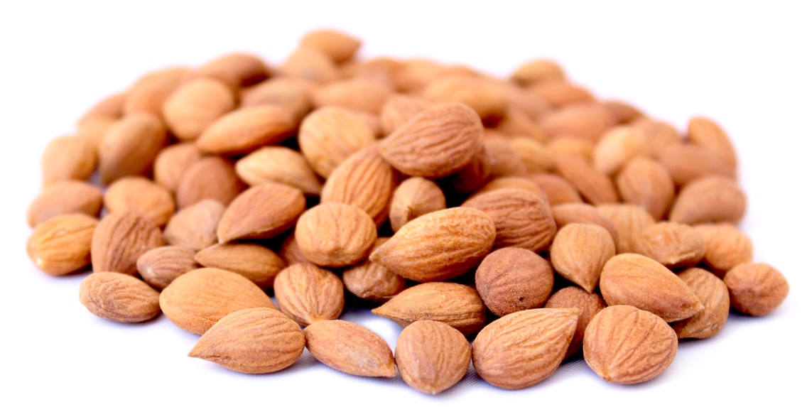 A Pile Of Almonds On A Plate