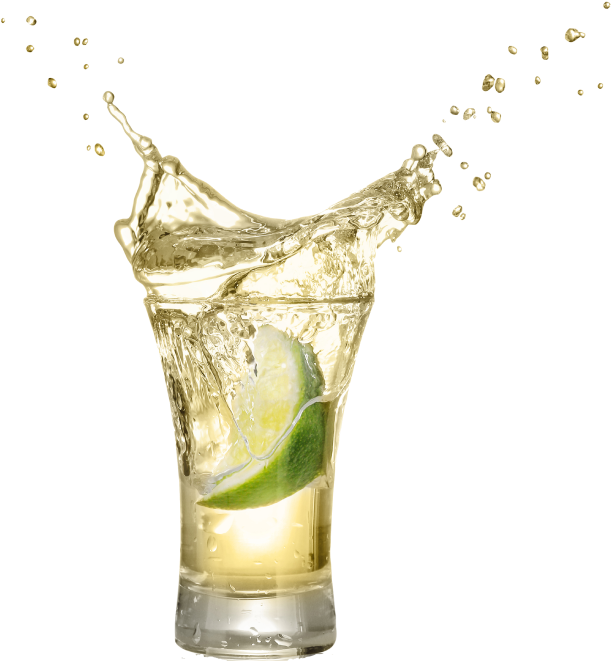 A Glass Of Liquid With A Lime Slice Splashing