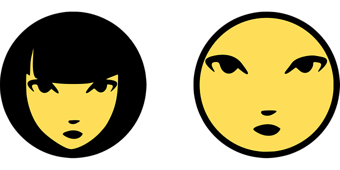 A Couple Of Faces In Black And Yellow