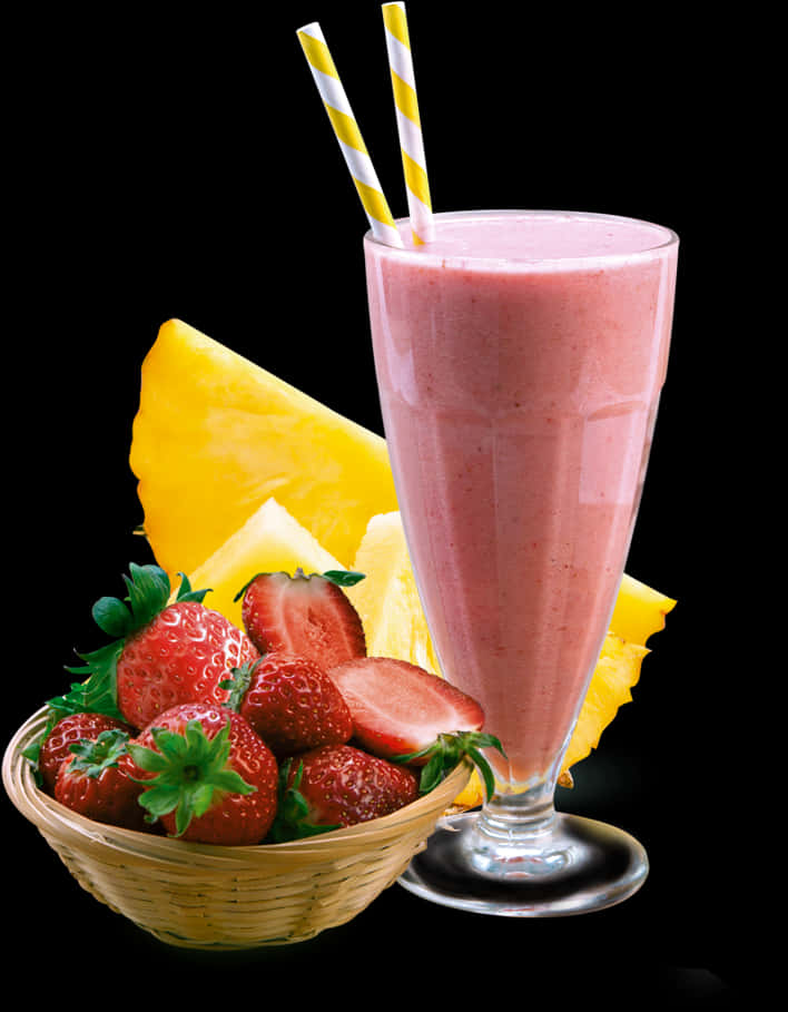 A Glass Of Pink Smoothie Next To A Basket Of Strawberries