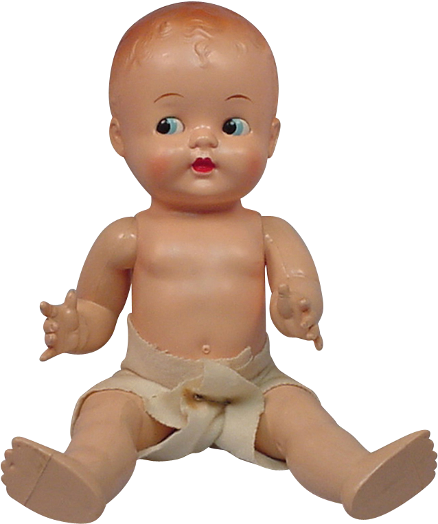 A Baby Doll Sitting On A Black Background