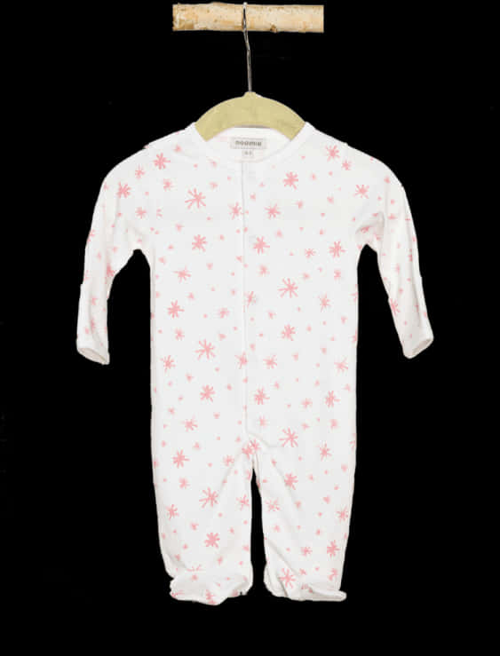A White And Pink Baby Outfit