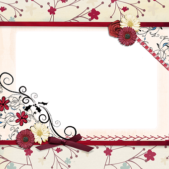 A Frame With Flowers And Ribbons