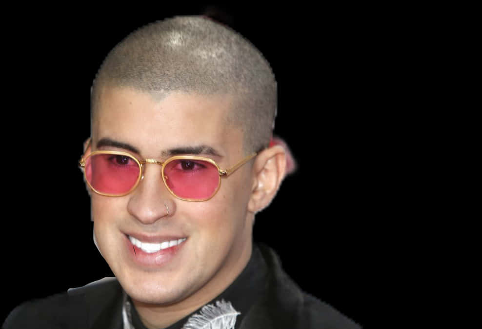 A Man With Shaved Head Wearing Pink Sunglasses