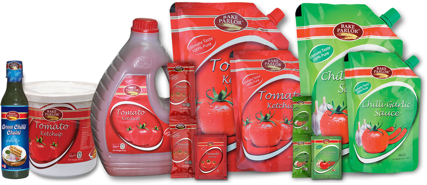 A Group Of Red And Green Packages Of Ketchup