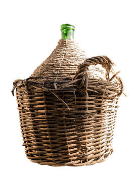 A Large Woven Basket With A Green Bottle