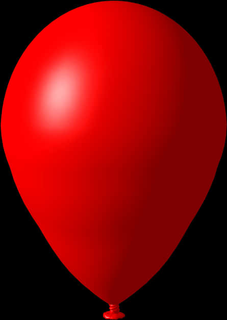 A Red Balloon On A Black Background