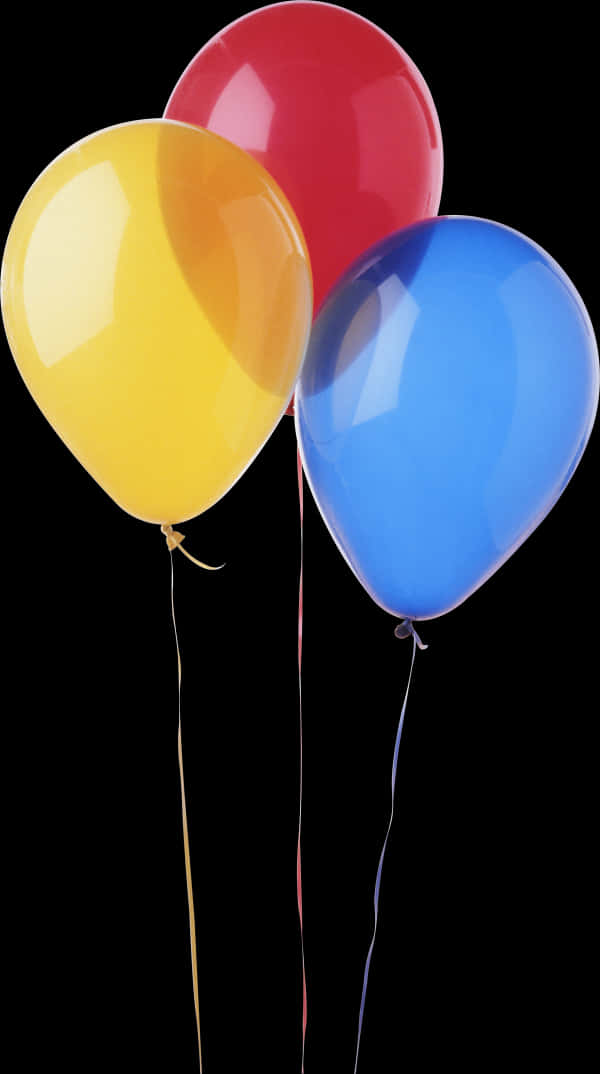 A Group Of Balloons On A Black Background