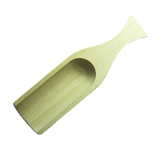 A Wooden Spoon With A Black Background