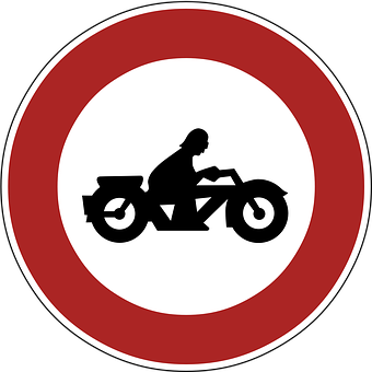 A Sign With A Person On A Motorcycle
