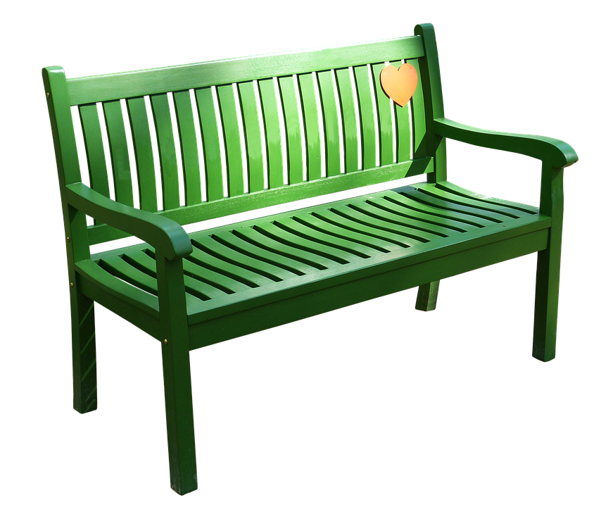 A Green Bench With A Heart On It