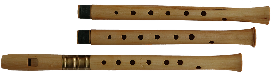 A Wooden Flute With Holes