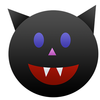 A Black Round Object With A Face And Teeth