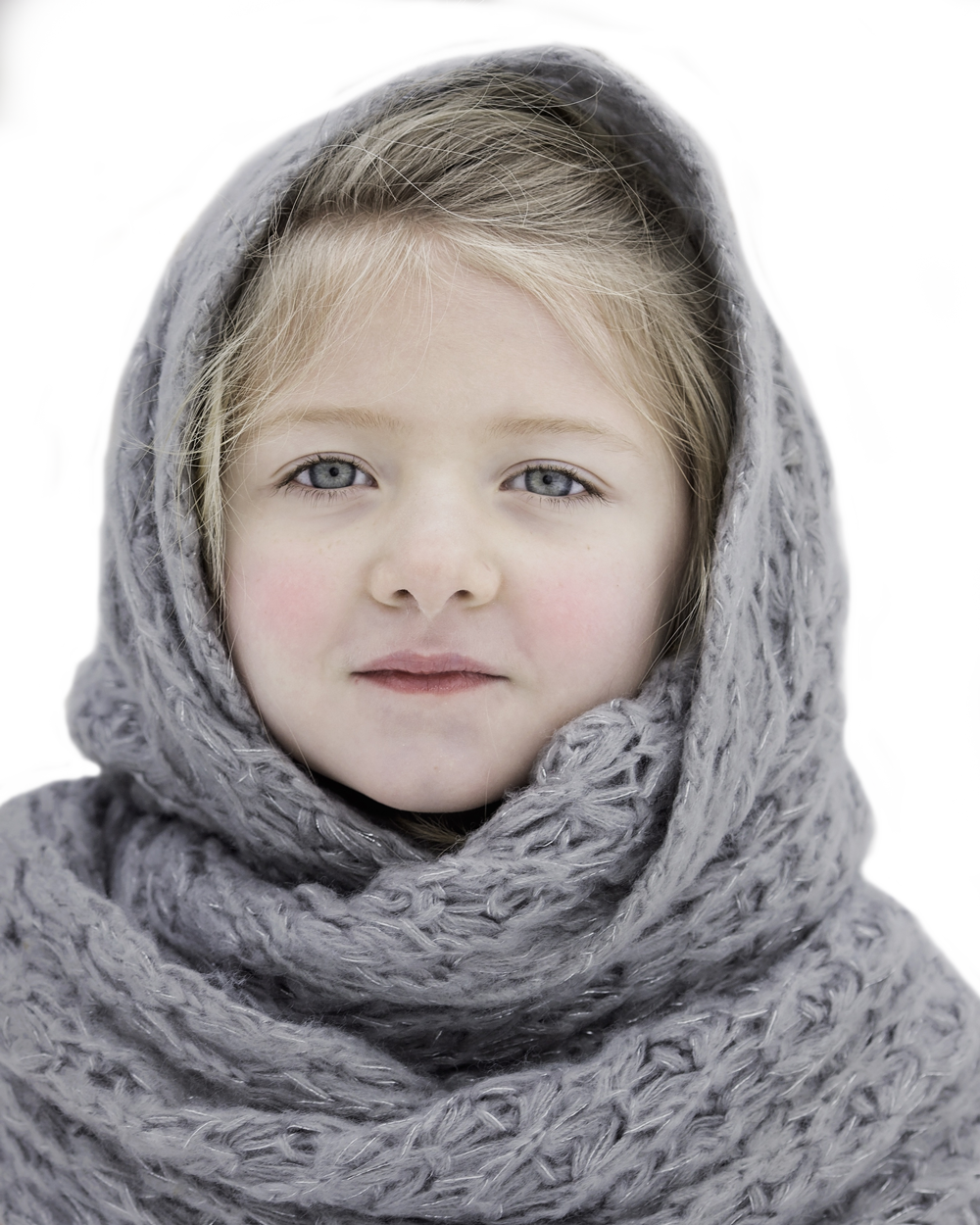A Girl With A Scarf Around Her Head