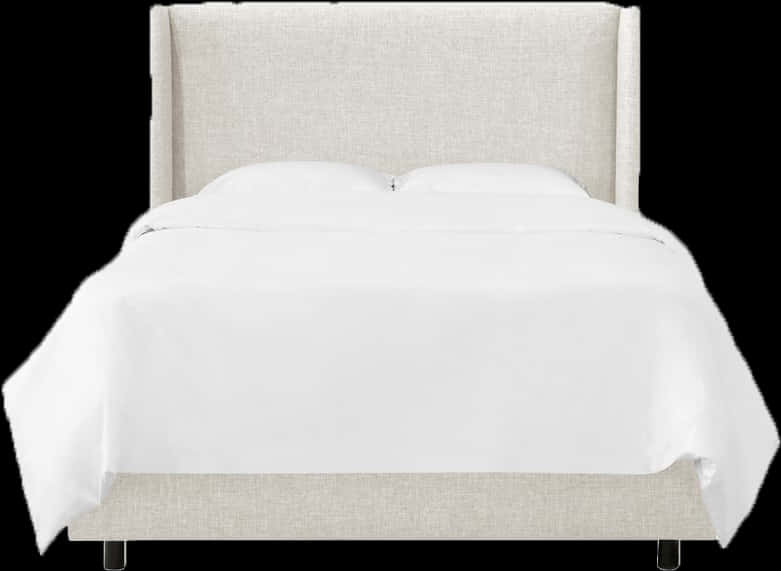 A White Bed With A White Sheet On It