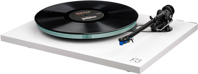 A Record Player On A White Surface