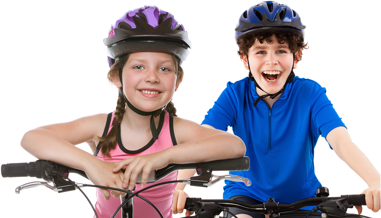A Boy And Girl Wearing Helmets And Smiling
