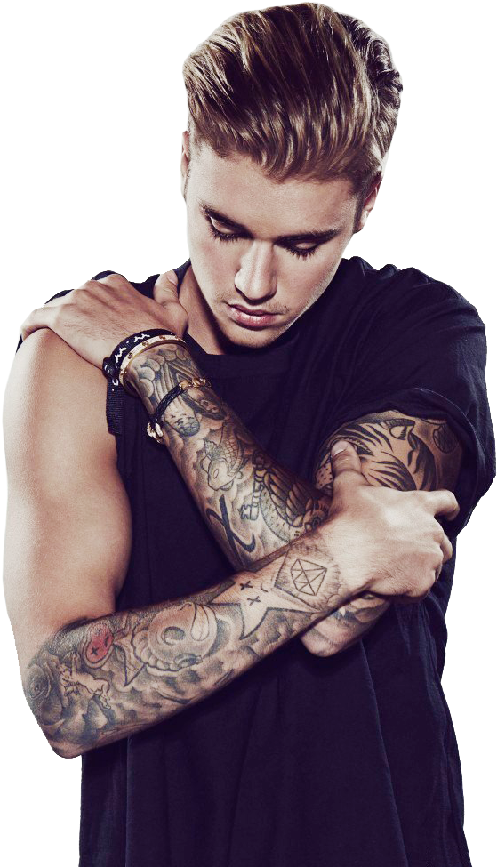 A Man With Tattoos On His Arms