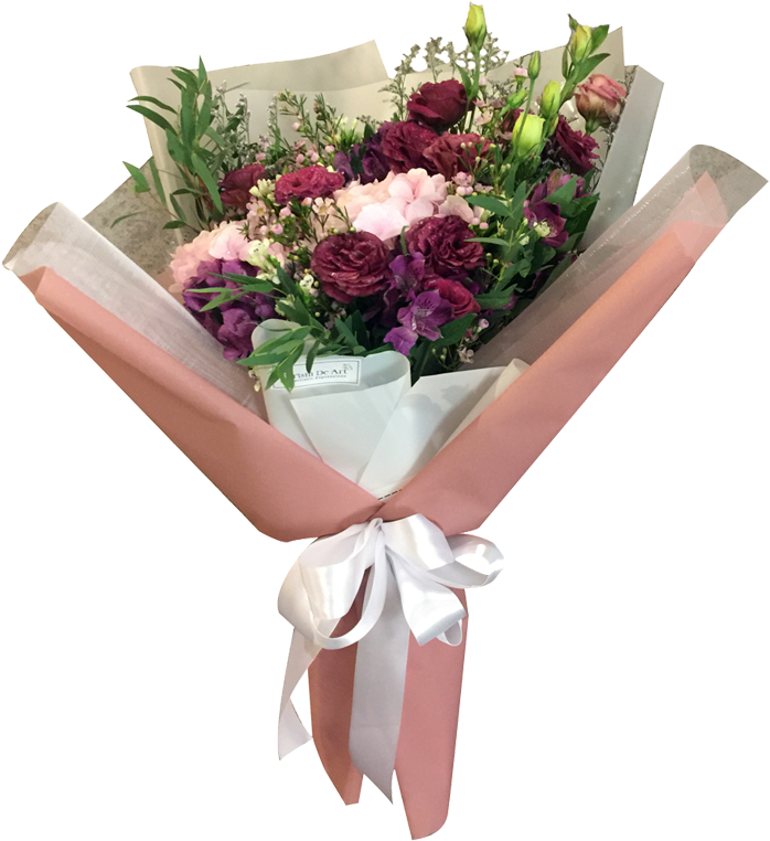 A Bouquet Of Flowers In A Wrapper