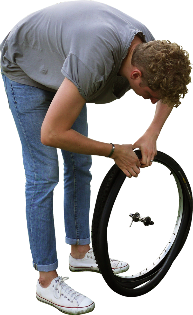 A Man Holding A Tire