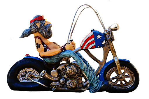A Statue Of A Man On A Motorcycle