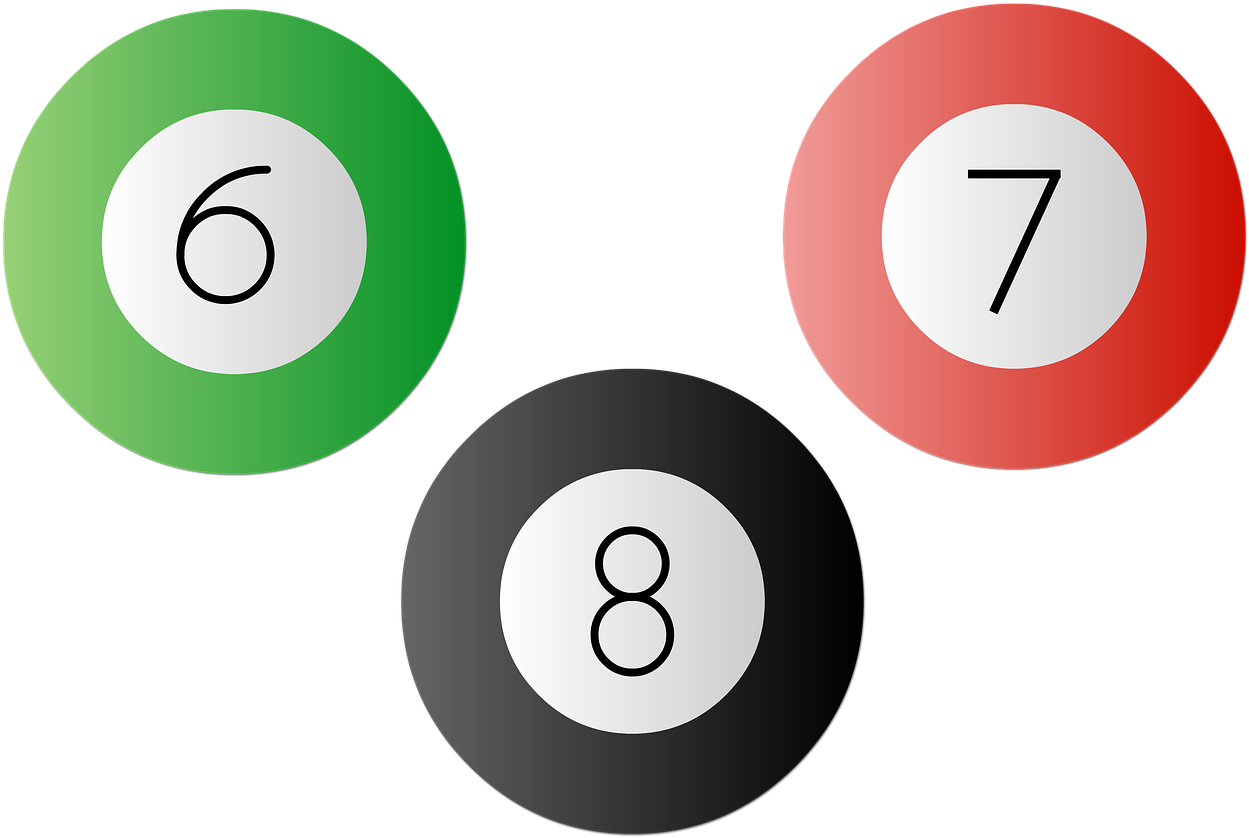 A Group Of Pool Balls With Numbers