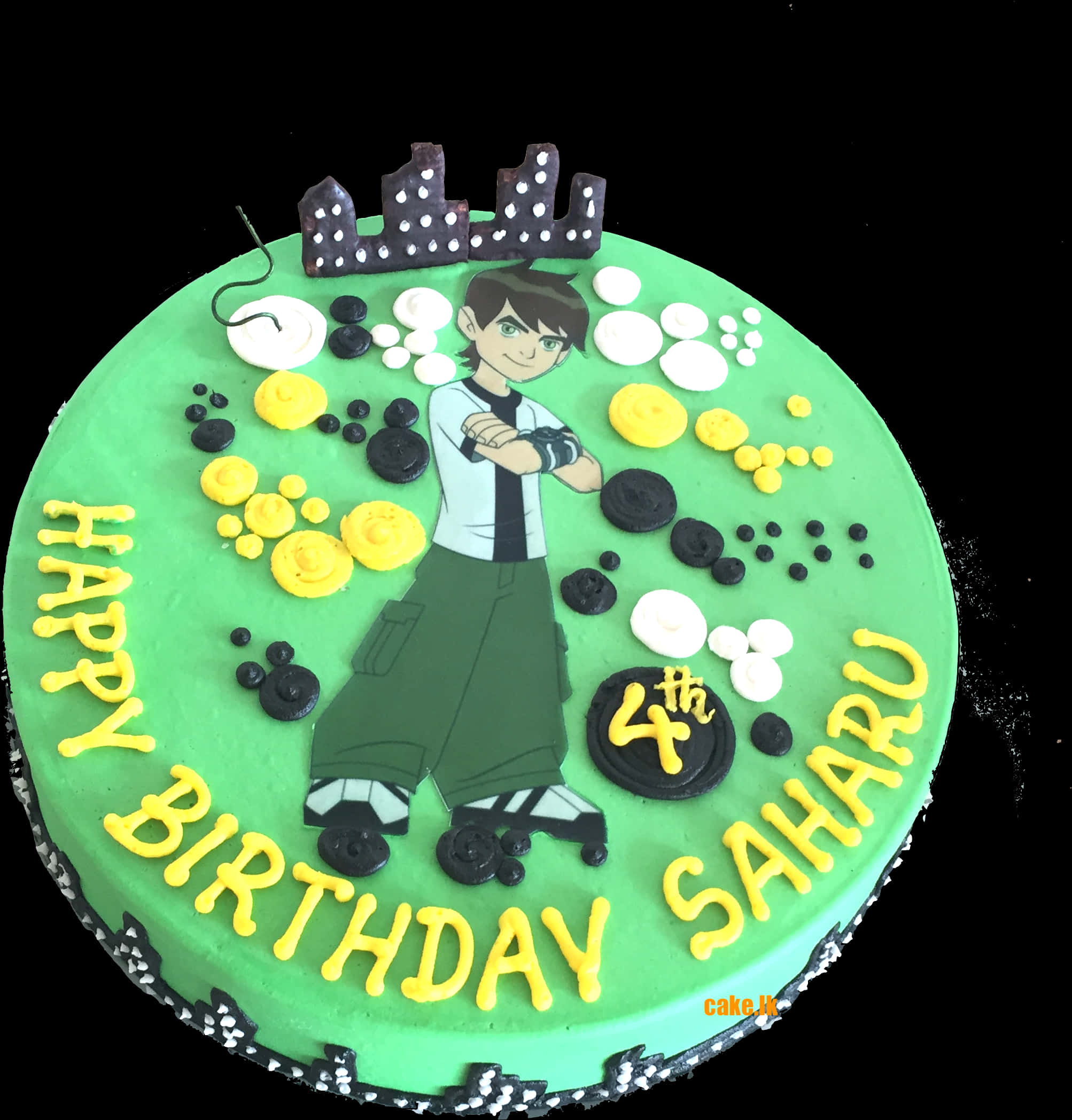 A Green Cake With Yellow Text And Cartoon Character On It