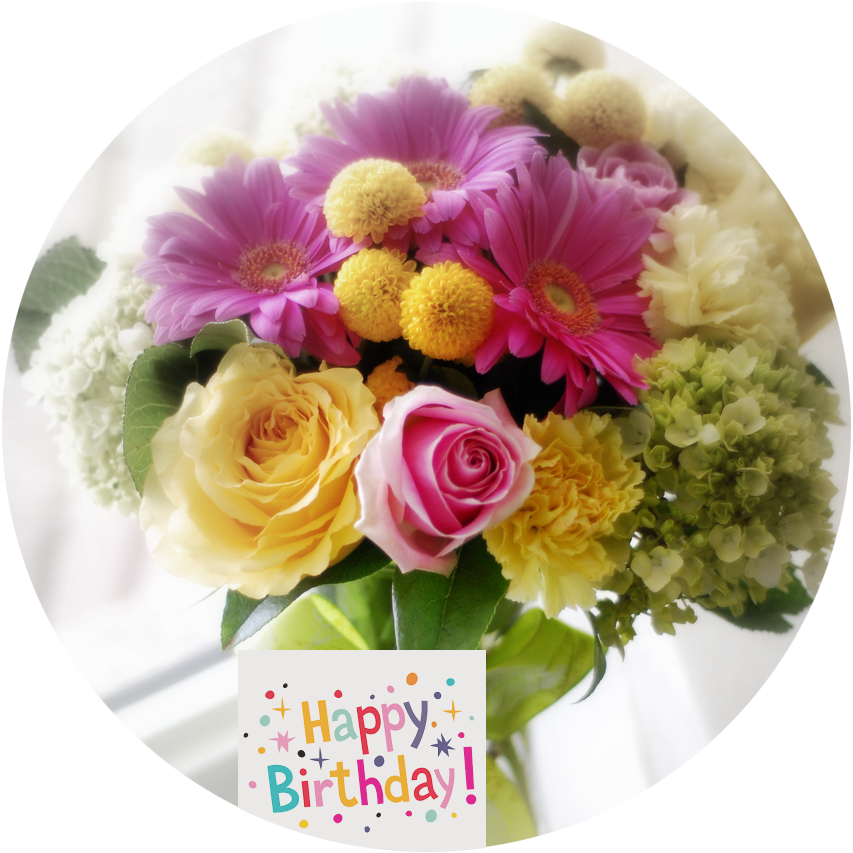 A Bouquet Of Flowers With A Happy Birthday Sign