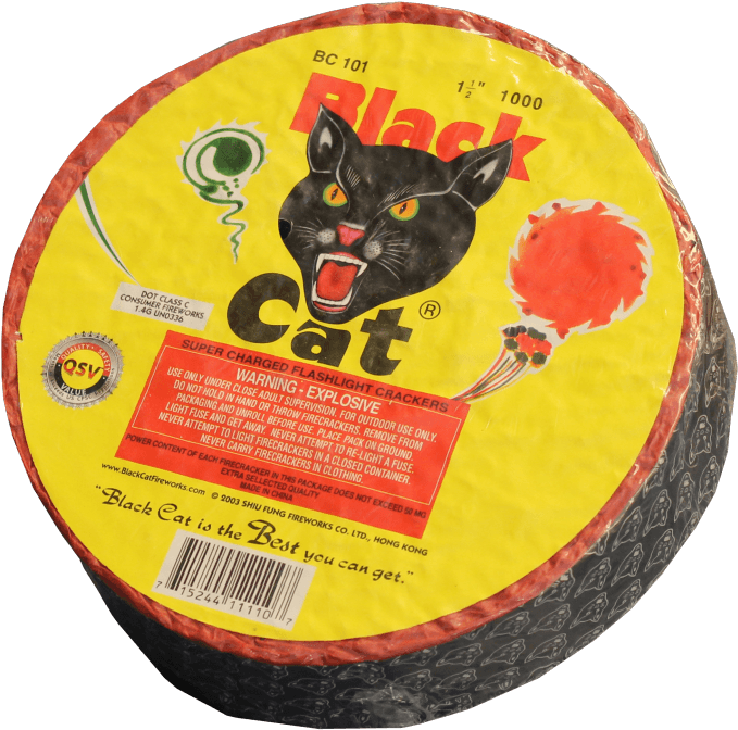 A Round Yellow And Red Object With A Black Cat On It