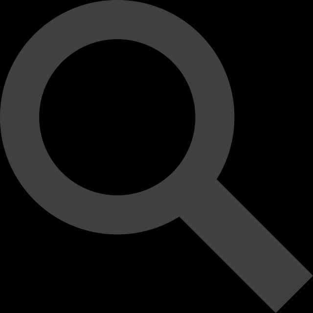 A Grey Magnifying Glass On A Black Background