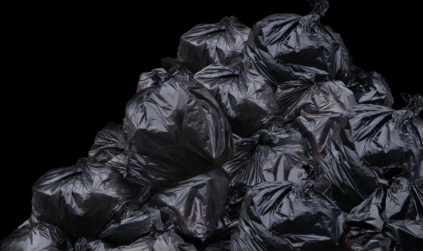 A Pile Of Black Garbage Bags