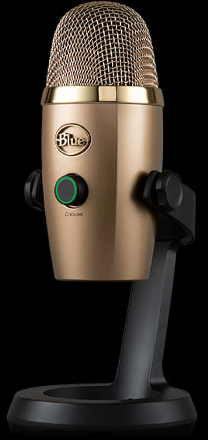 A Gold Microphone With A Black Handle