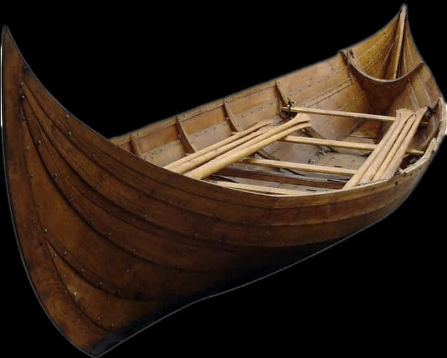 A Wooden Boat With Paddles