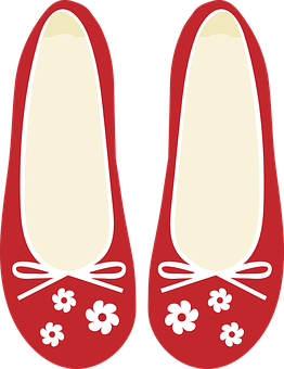 A Pair Of Red Shoes With White Flowers