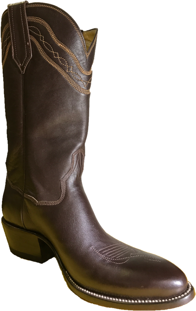 A Brown Cowboy Boot With A Black Background