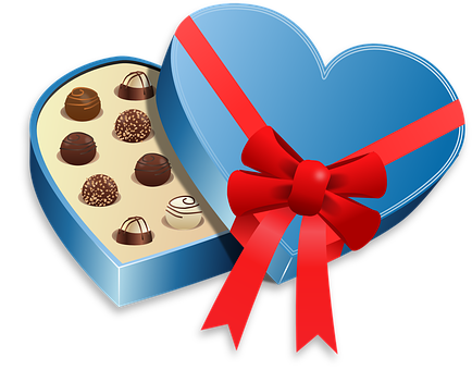 A Box Of Chocolates With A Red Bow
